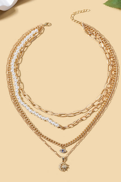Gold Celestial Layered Necklace  with Pearl Accents, Evil Eye & Sun Moon Pendants
